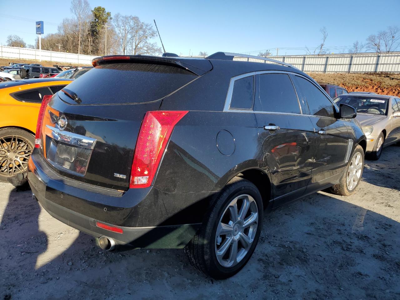2015 Cadillac SRX VIN 3GYFNEE3XFS559871 Copart auction photo, burn damage thumbnail 3