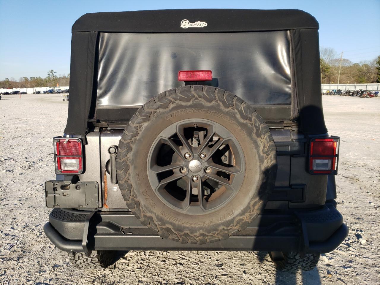 2017 Jeep Wrangler VIN 1C4BJWEG1HL566483 Copart auction photo, side damage thumbnail 6