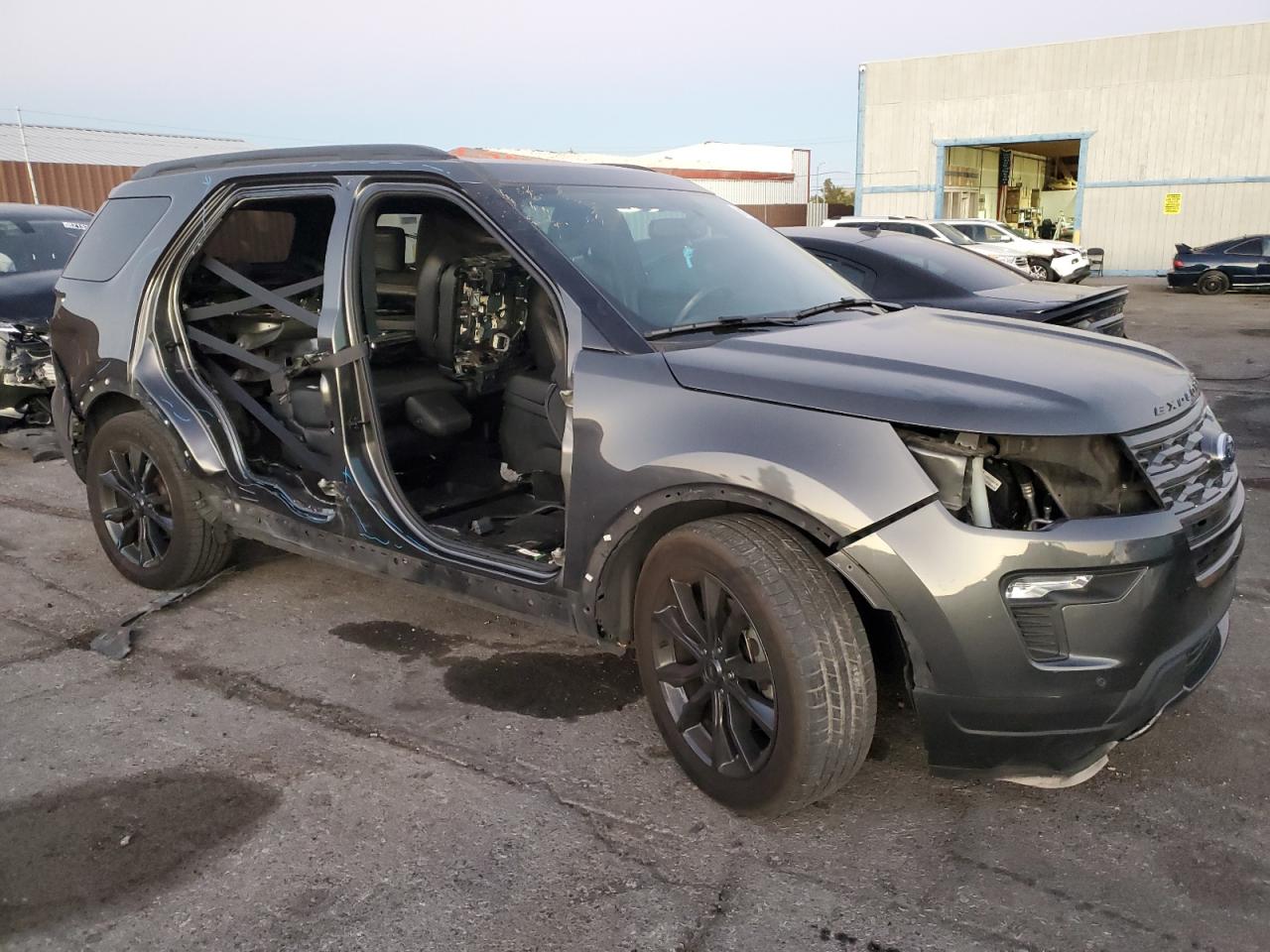 2018 Ford Explorer VIN 1FM5K7D87JGC72803 Copart auction photo, side / front end damage thumbnail 4