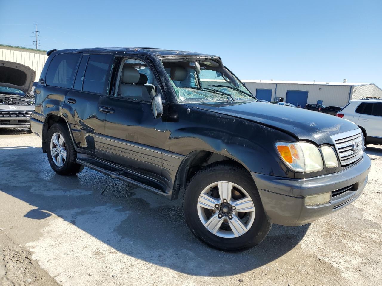 2004 Lexus LX VIN JTJHT00W043536558 Copart auction photo, rollover / all over damage thumbnail 4