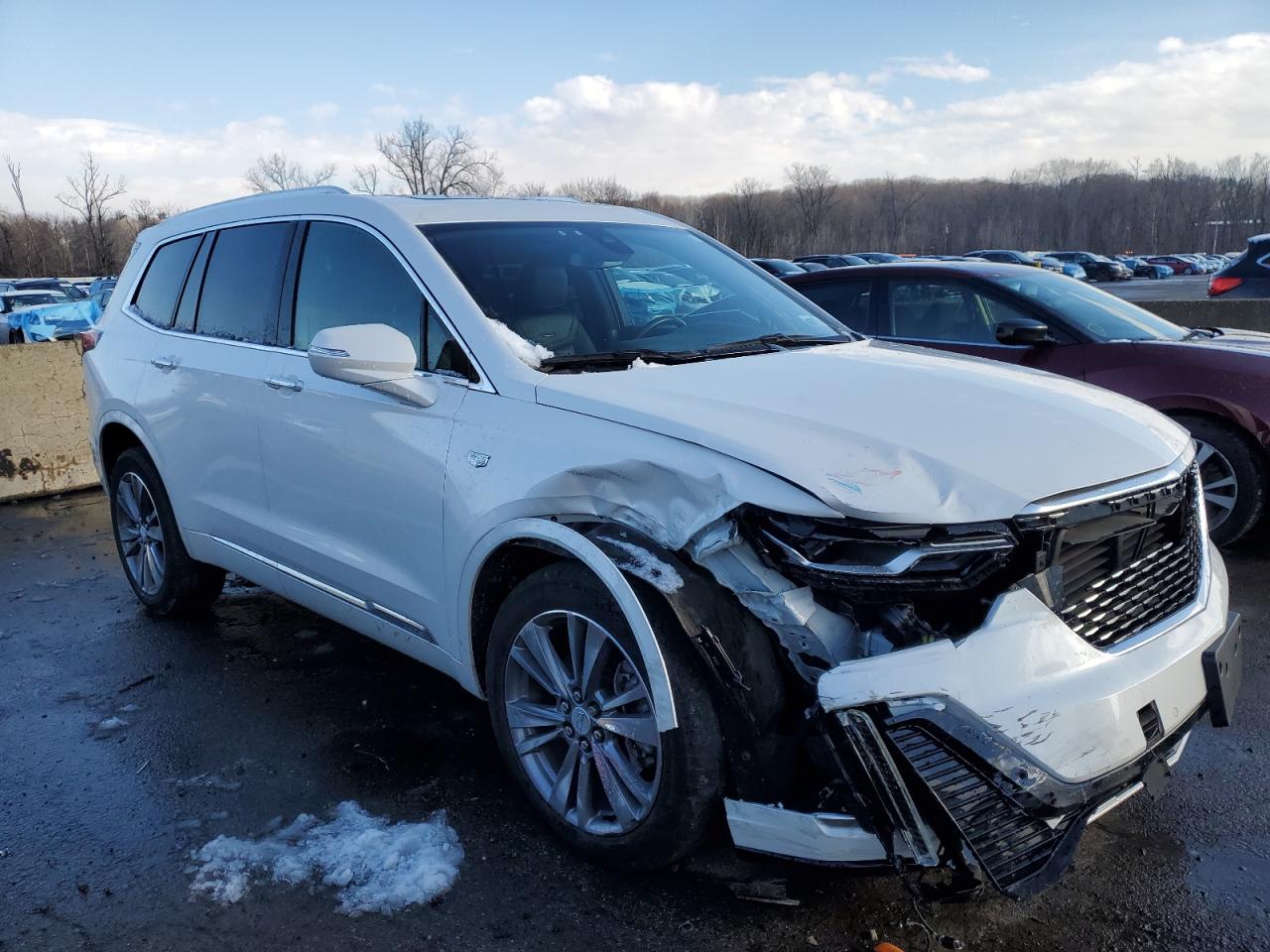 2022 Cadillac XT6 VIN 1GYKPDRS1NZ124470 Copart auction photo, front end / minor dent/scratches damage thumbnail 4