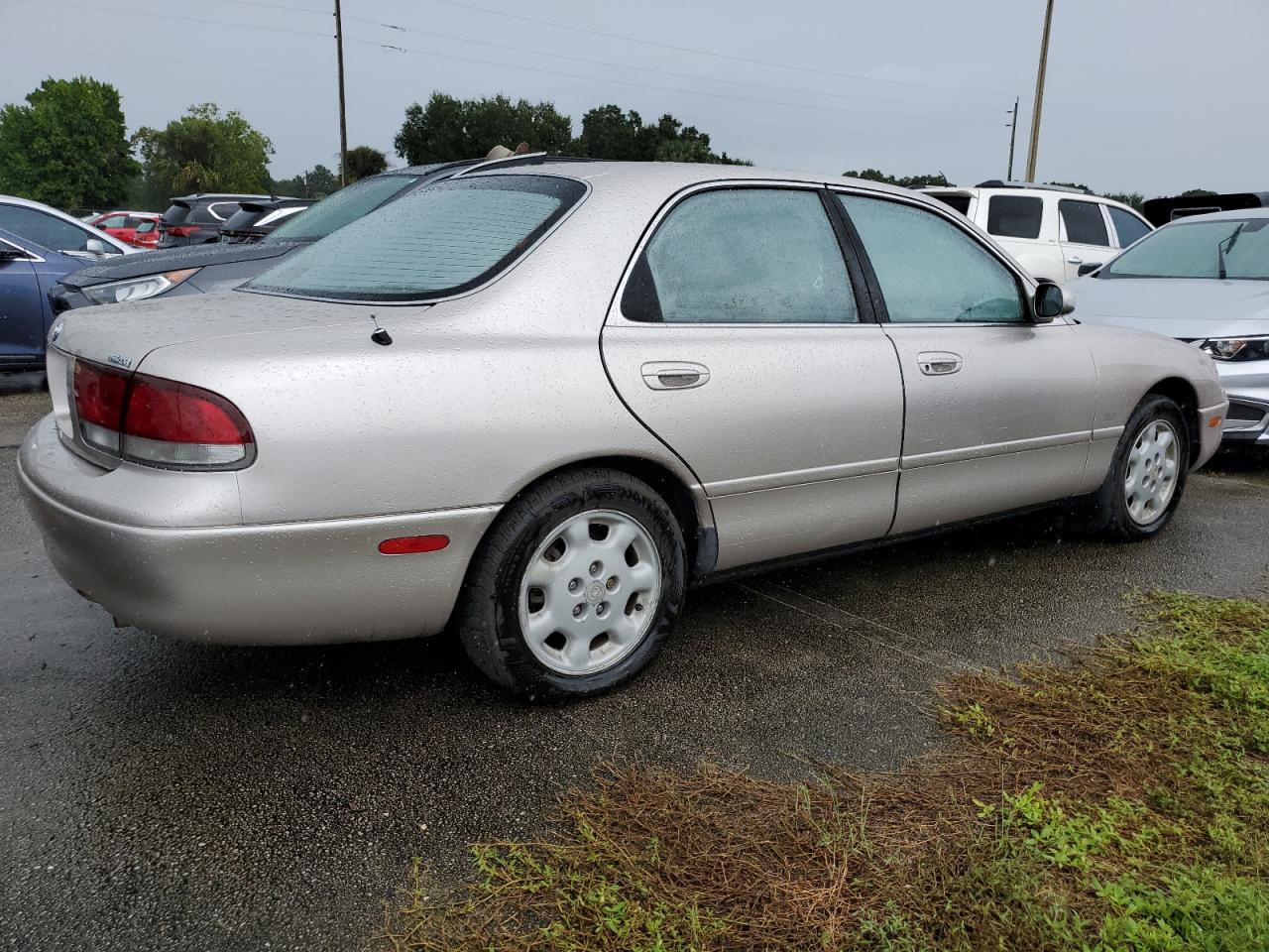 1993 Mazda 626 VIN 1YVGE22B9P5208685 Copart auction photo, water/flood damage thumbnail 3