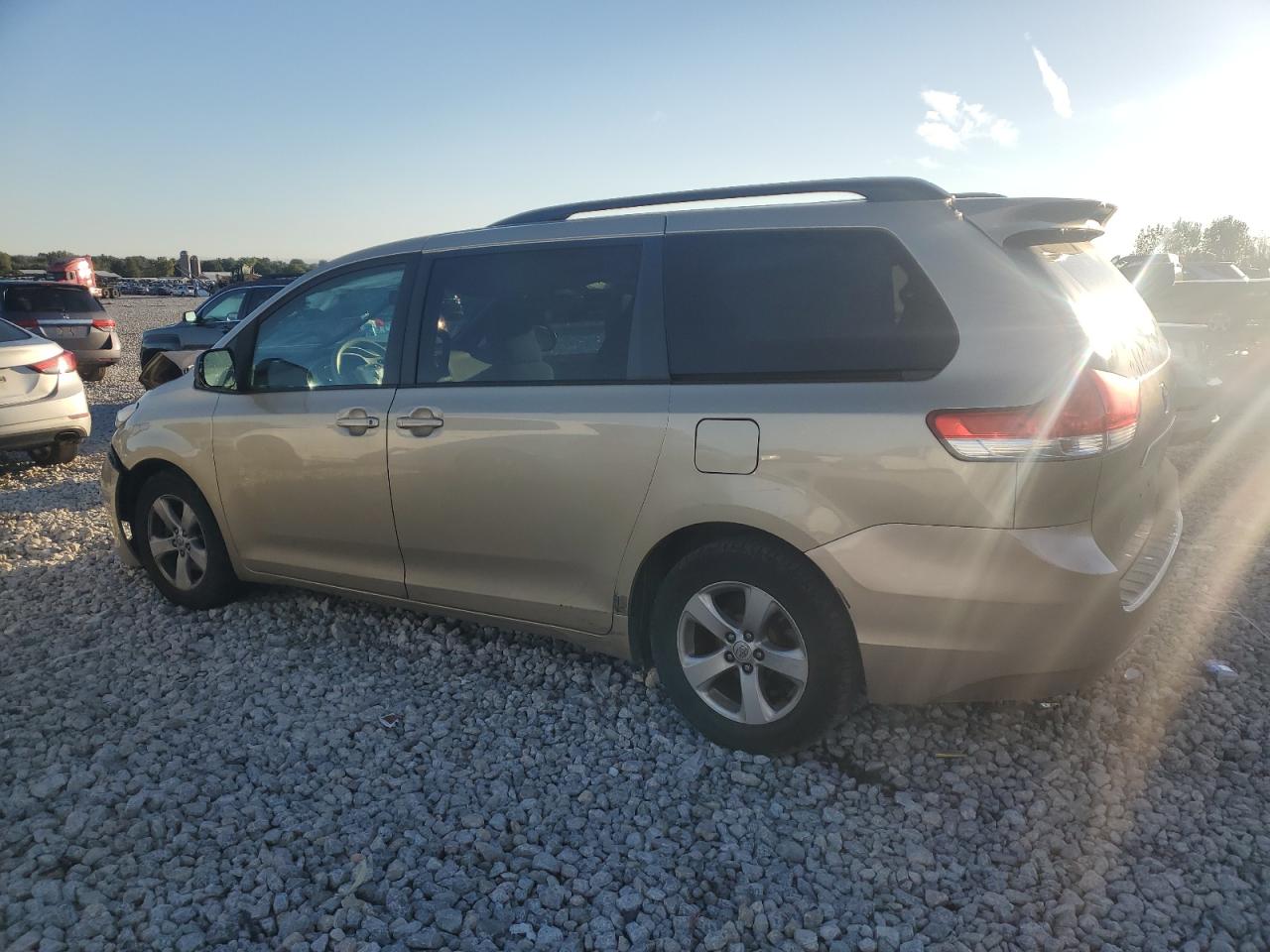 2012 Toyota Sienna VIN 5TDKK3DC6CS212668 Copart auction photo, front end / side damage thumbnail 2
