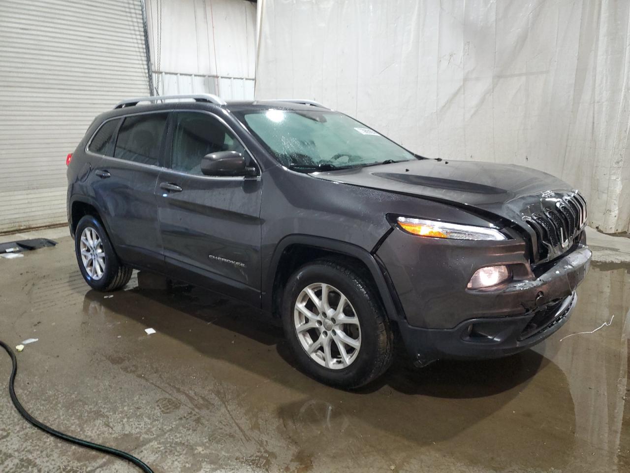 2015 Jeep Grand Cherokee VIN 1C4PJMCS7FW565268 Copart auction photo, front end / side damage thumbnail 4
