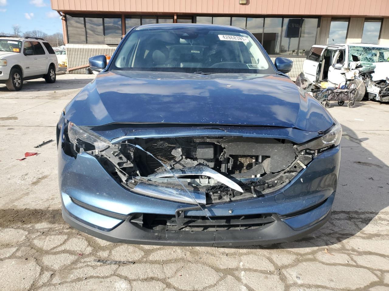 2019 Mazda CX-5 VIN JM3KFBCM8K0686204 Copart auction photo, front end / side damage thumbnail 5