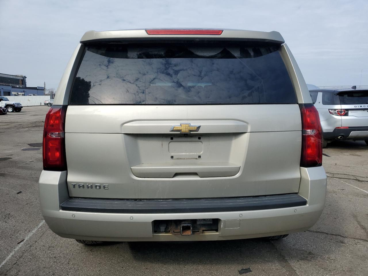 2015 Chevrolet Tahoe VIN 1GNSKBKCXFR509787 Copart auction photo, front end / side damage thumbnail 6