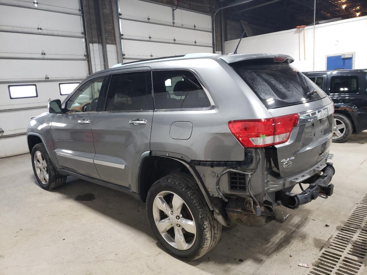 2011 Jeep Grand Cherokee VIN 1J4RR6GT2BC626080 Copart auction photo, rear end damage thumbnail 2