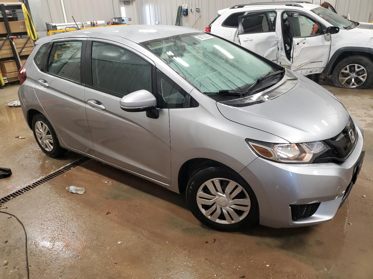 2017 Honda Fit VIN 3HGGK5H54HM712401 Copart auction photo, hail damage thumbnail 4