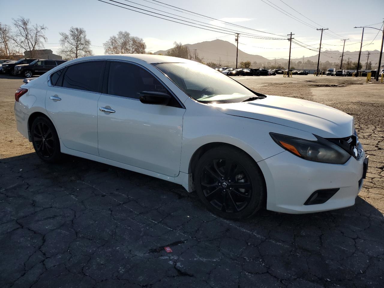 2017 Nissan Altima VIN 1N4AL3AP9HC262107 Copart auction photo, front end damage thumbnail 4