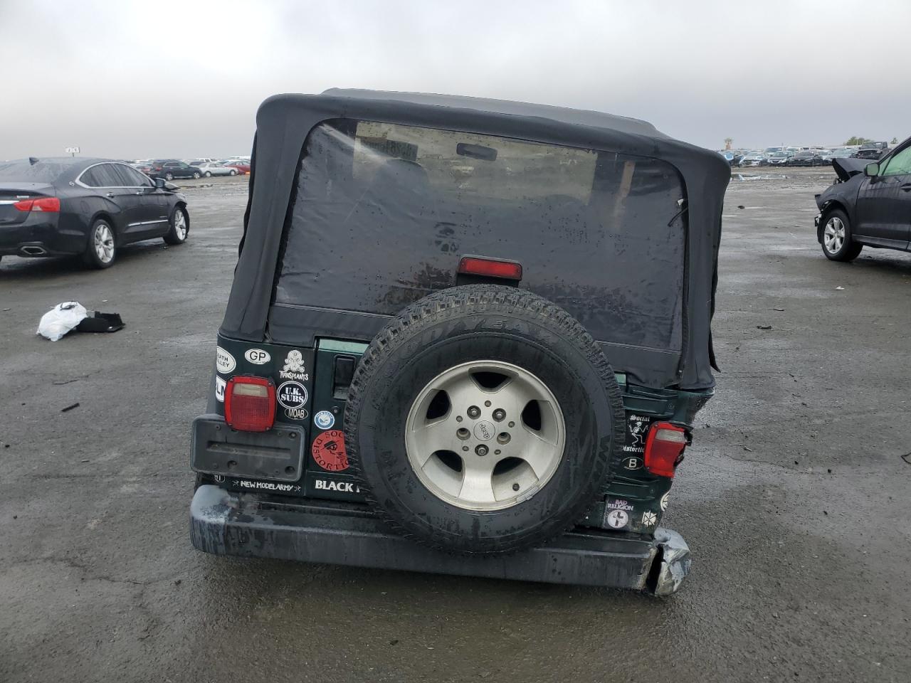 1999 Jeep Wrangler VIN 1J4FY19S7XP487349 Copart auction photo, all over damage thumbnail 6