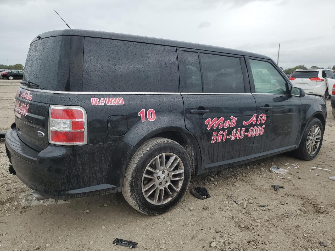 2014 Ford Flex VIN 2FMGK5C82EBD41764 Copart auction photo, front end / side damage thumbnail 3