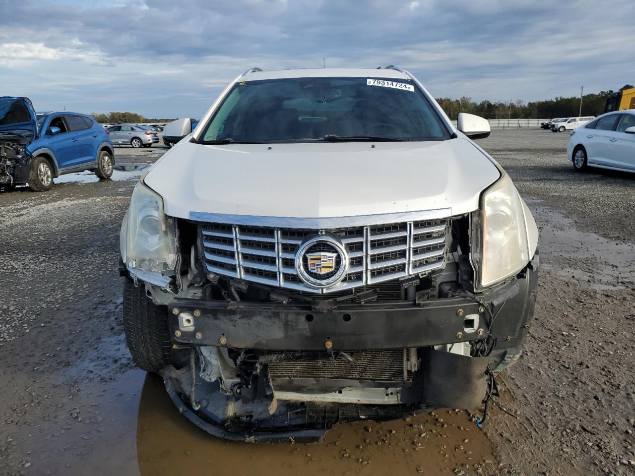 2014 Cadillac SRX VIN 3GYFNCE34ES628136 Copart auction photo, front end damage thumbnail 5