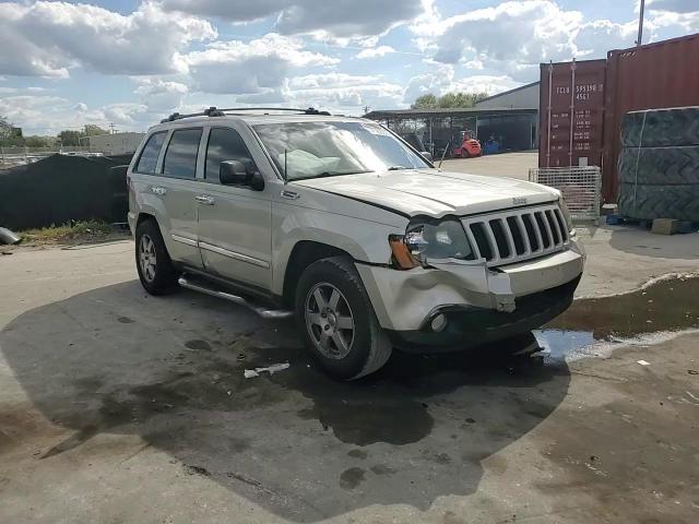 2010 Jeep Grand Cherokee VIN 1J4PS4GK3AC121560 Copart auction photo, side / front end damage thumbnail 11