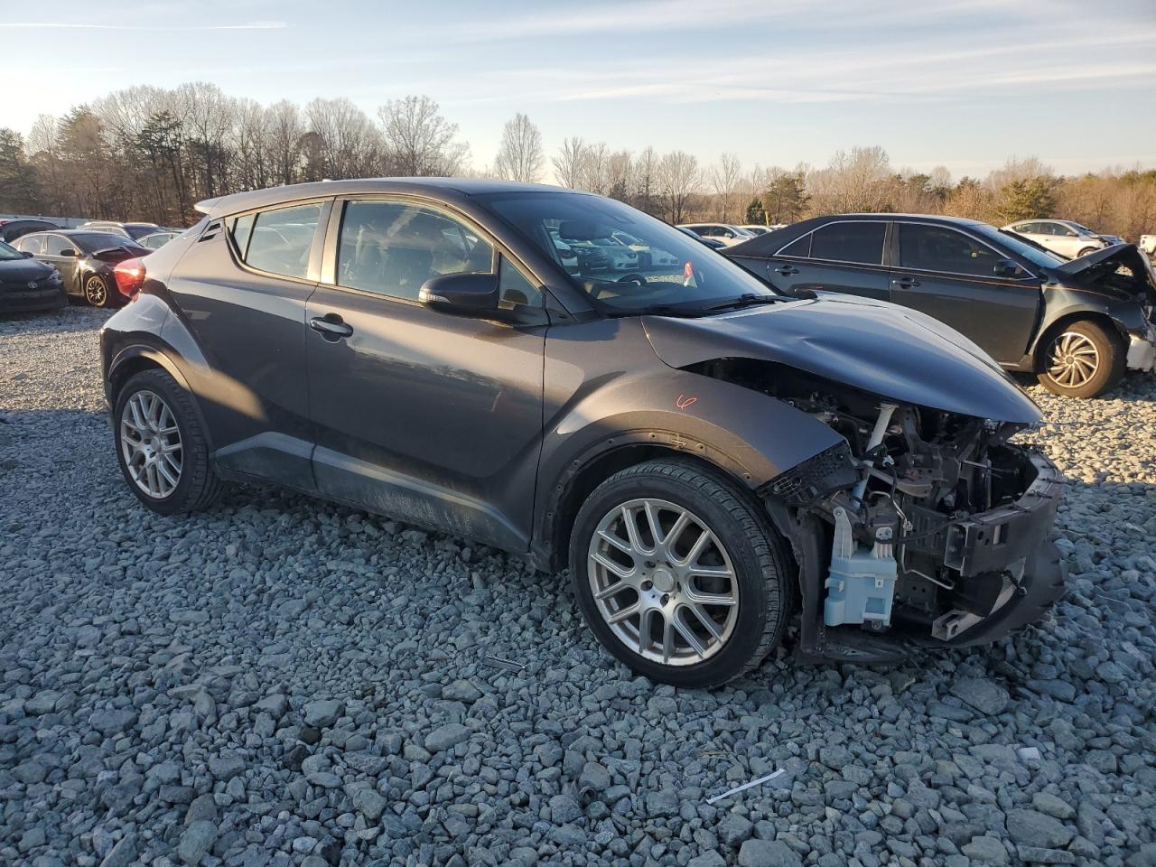 2018 Toyota C-HR VIN NMTKHMBX9JR005665 Copart auction photo, front end / side damage thumbnail 4