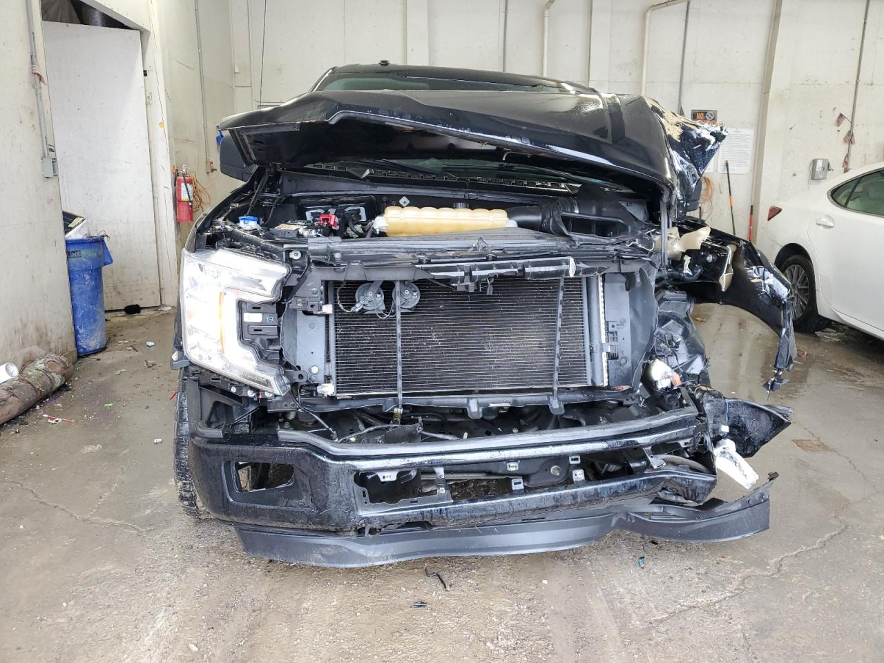2018 Ford F-150 VIN 1FTEW1E5XJKF00557 Copart auction photo, front end / undercarriage damage thumbnail 5
