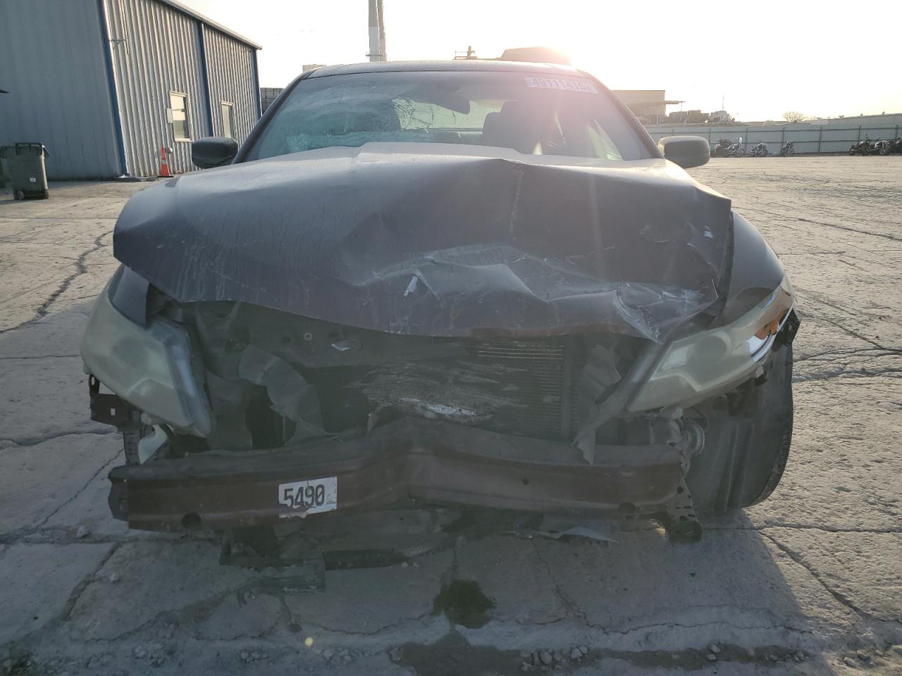 2010 Ford Taurus VIN 1FAHP2DW3AG111911 Copart auction photo, front end / minor dent/scratches damage thumbnail 5