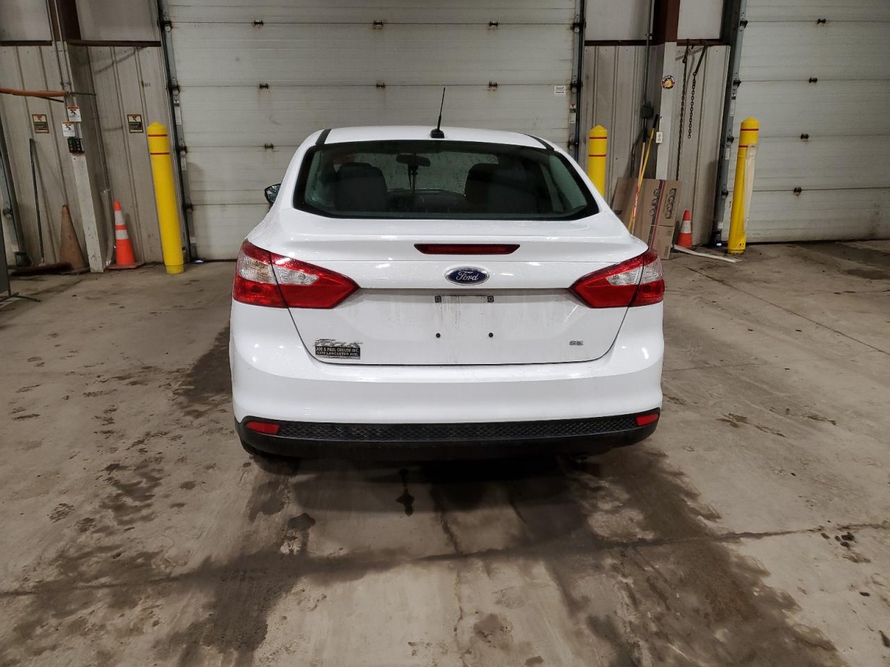 2014 Ford Focus VIN 1FADP3F22EL393356 Copart auction photo, front end / undercarriage damage thumbnail 6