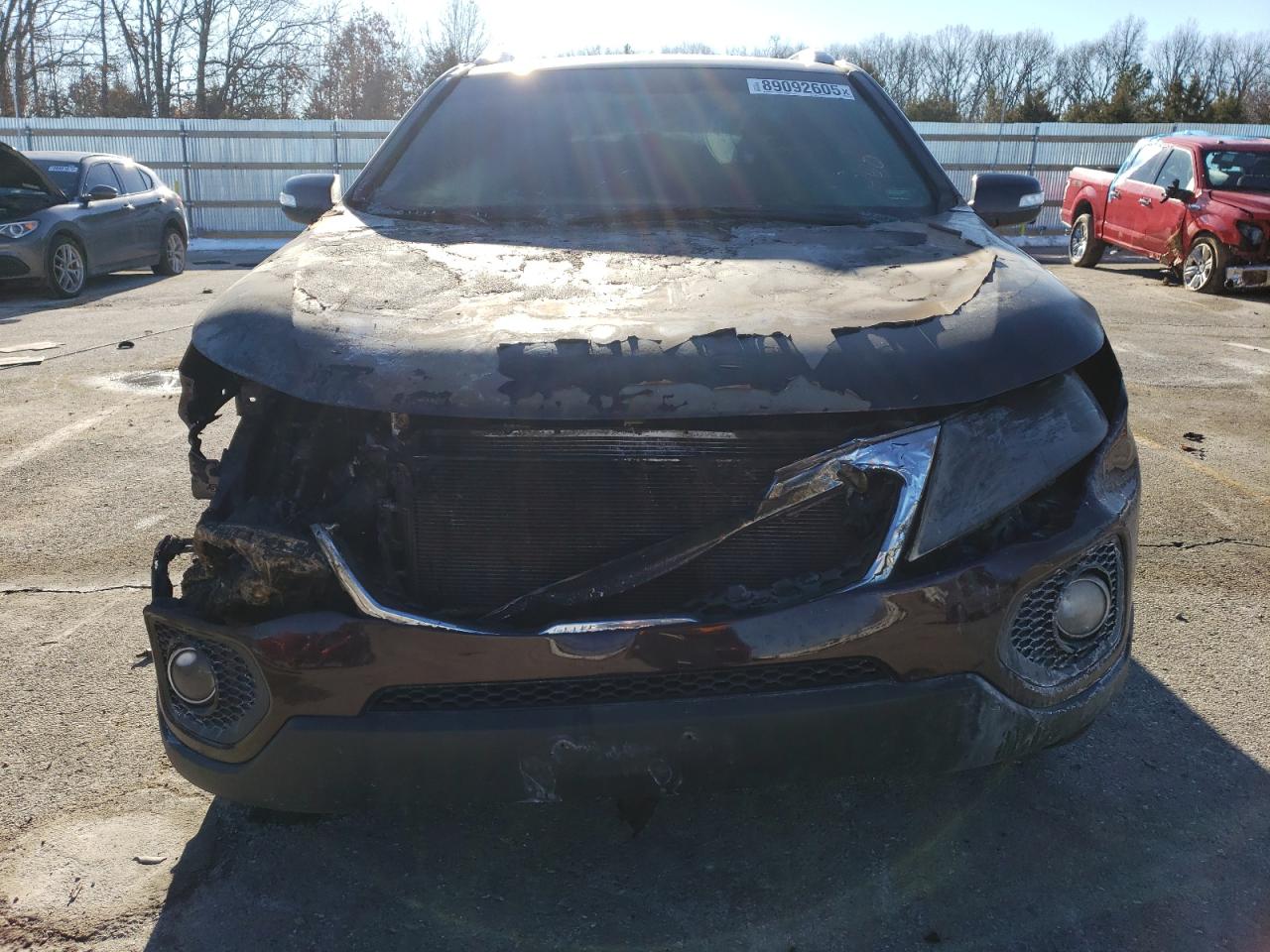 2012 KIA Sorento VIN 5XYKU3A60CG256039 Copart auction photo, burn damage thumbnail 5