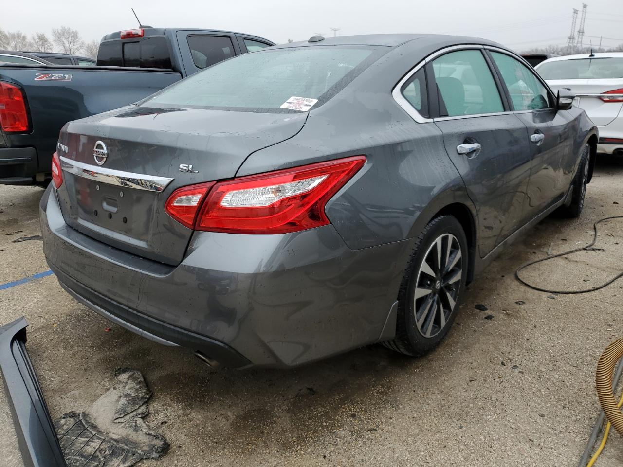 2017 Nissan Altima VIN 1N4AL3AP2HC499134 Copart auction photo, front end / side damage thumbnail 3