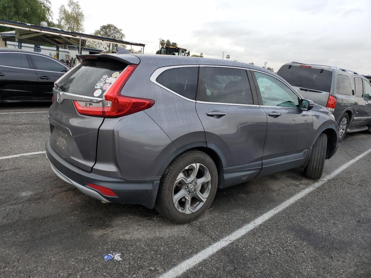 2019 Honda CR-V VIN 5J6RW1H50KA022096 Copart auction photo, side / minor dent/scratches damage thumbnail 3