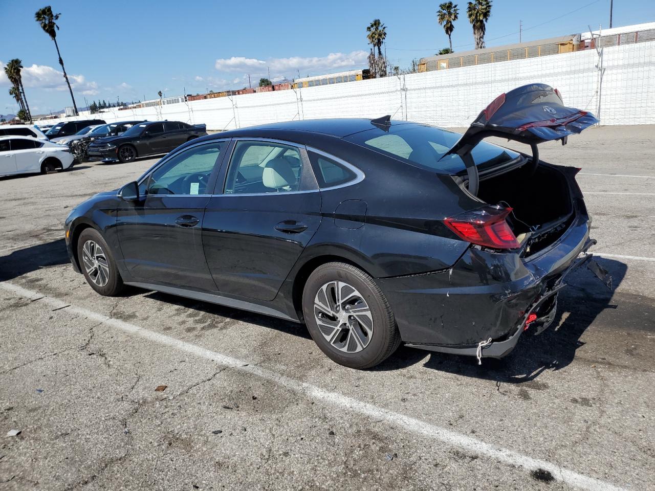 2023 Hyundai Sonata VIN KMHL24JJ6PA081656 Copart auction photo, rear end / minor dent/scratches damage thumbnail 2