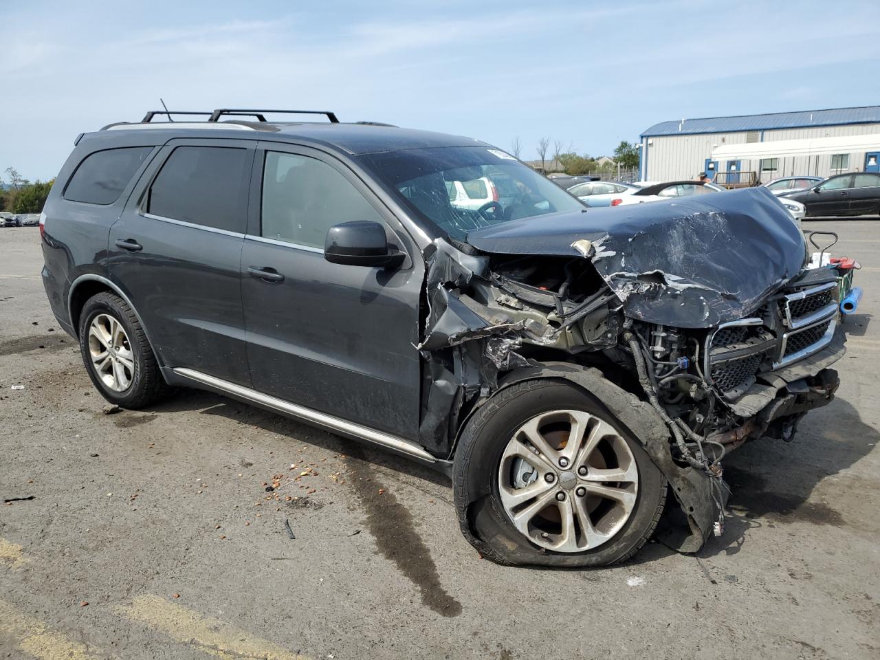 2011 Dodge Durango VIN 1D4RE2GG1BC720595 Copart auction photo, front end / side damage thumbnail 4