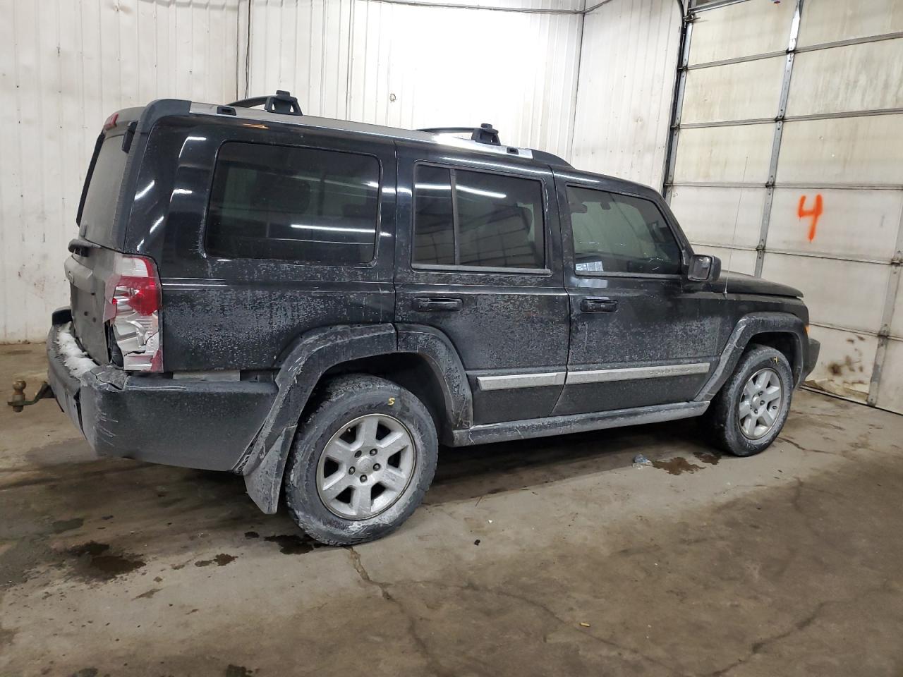 2007 Jeep Commander VIN 1J8HG58267C672759 Copart auction photo, rear end damage thumbnail 3