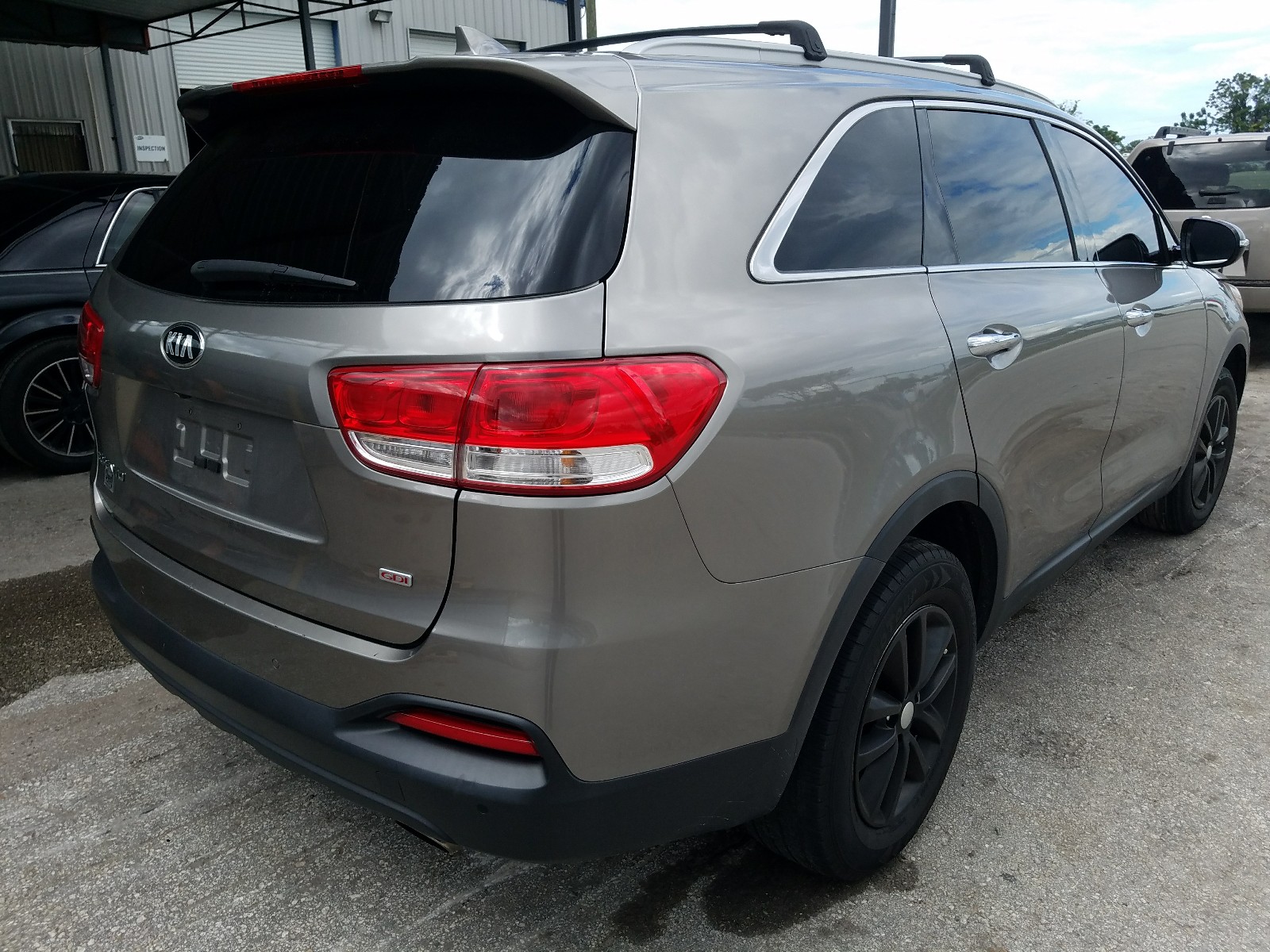 2016 KIA Sorento VIN 5XYPG4A34GG063357 Copart auction photo, burn damage thumbnail 4