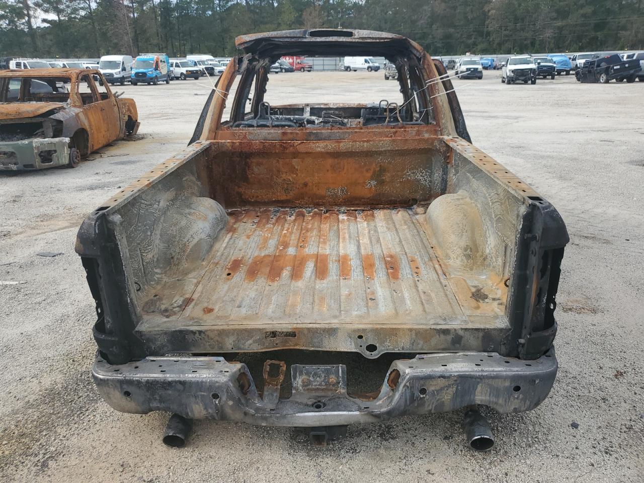2016 RAM 1500 VIN 3C6RR7LT7GG265958 Copart auction photo, burn damage thumbnail 6