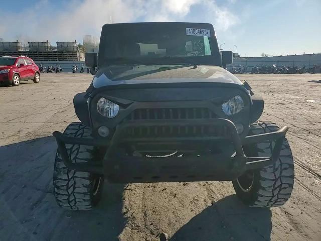 2015 Jeep Wrangler VIN 1C4BJWDG2FL557127 Copart auction photo, side / minor dent/scratches damage thumbnail 10