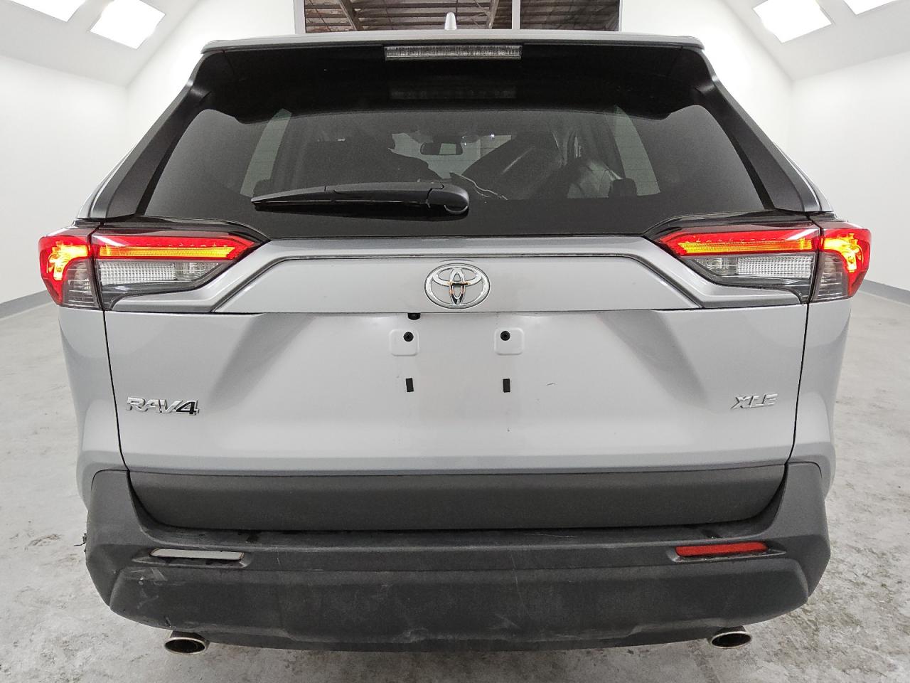 2024 Toyota RAV 4 VIN 2T3W1RFV3RC290551 Copart auction photo, front end / rear end damage thumbnail 6