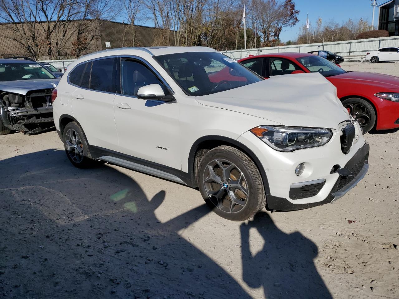 2017 BMW X1 VIN WBXHT3C36H5F78075 Copart auction photo, front end / side damage thumbnail 4