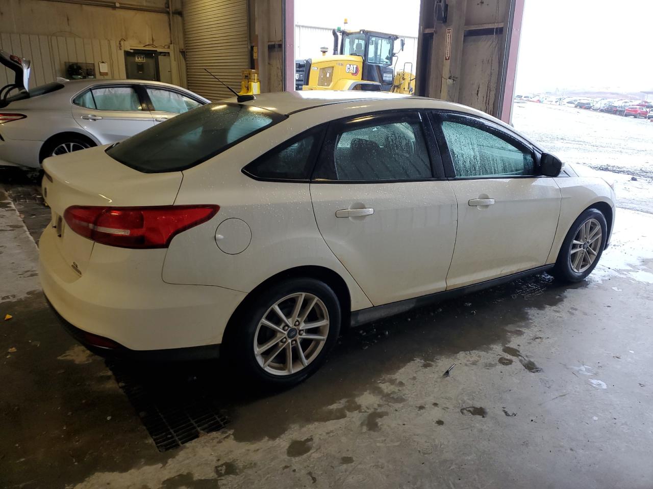 2015 Ford Focus VIN 1FADP3F2XFL202316 Copart auction photo, mechanical / minor dent/scratches damage thumbnail 3