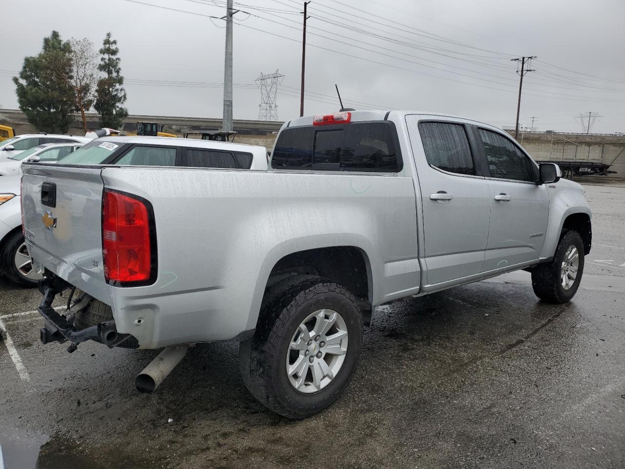 2017 Chevrolet Colorado VIN 1GCGSCE16H1160627 Copart auction photo, front end / all over damage thumbnail 3
