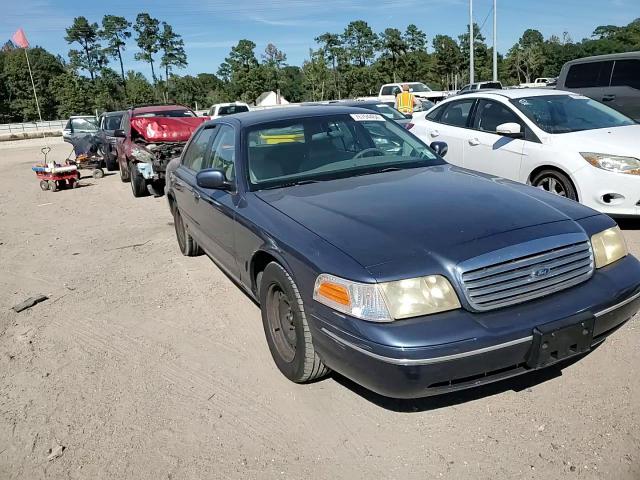 1998 Ford Crown Victoria VIN 2FAFP73W1WX167689 Copart auction photo, side damage thumbnail 11
