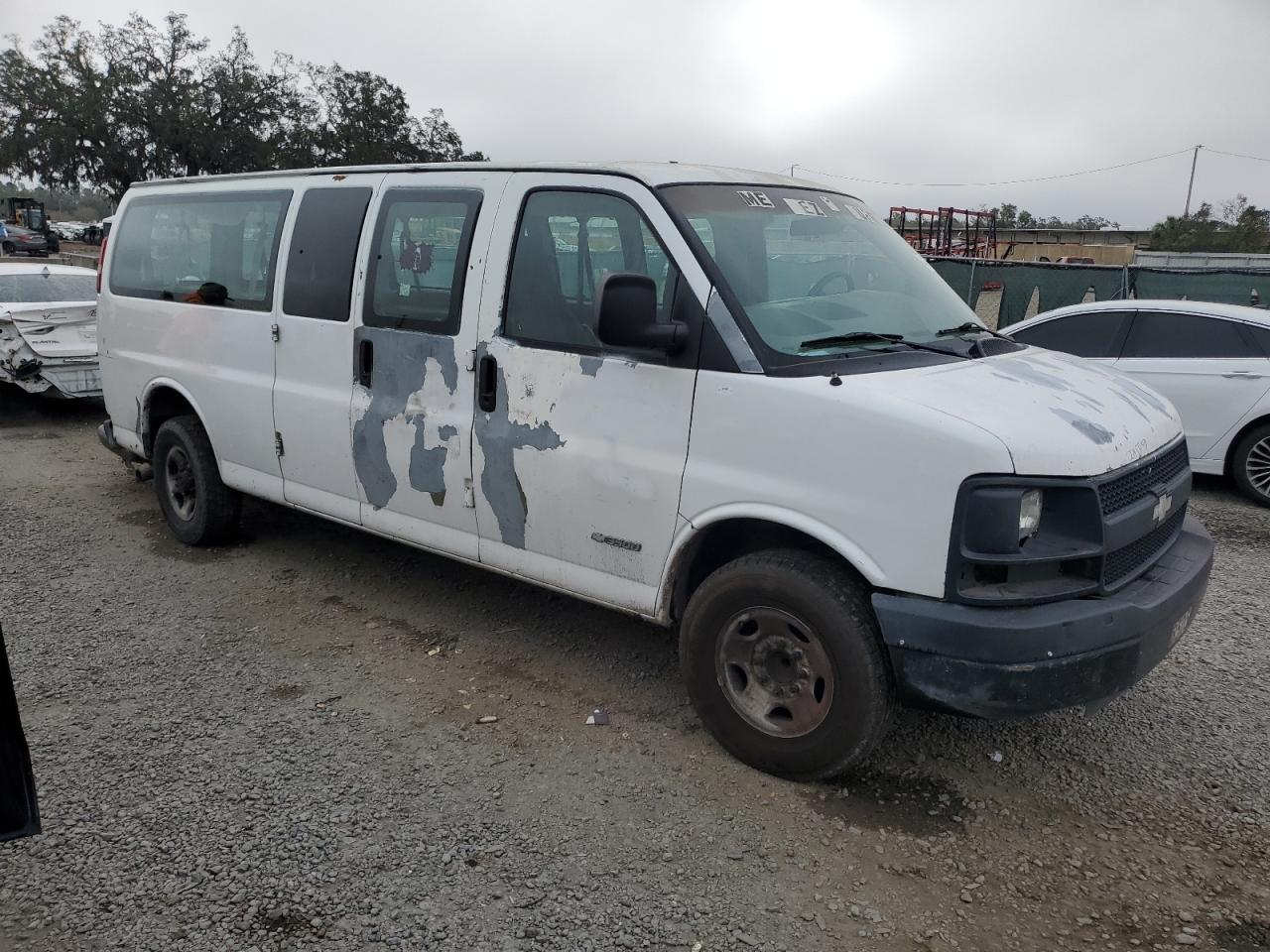 2004 Chevrolet Express VIN 1GAHG39U641184875 Copart auction photo, rear end / side damage thumbnail 4