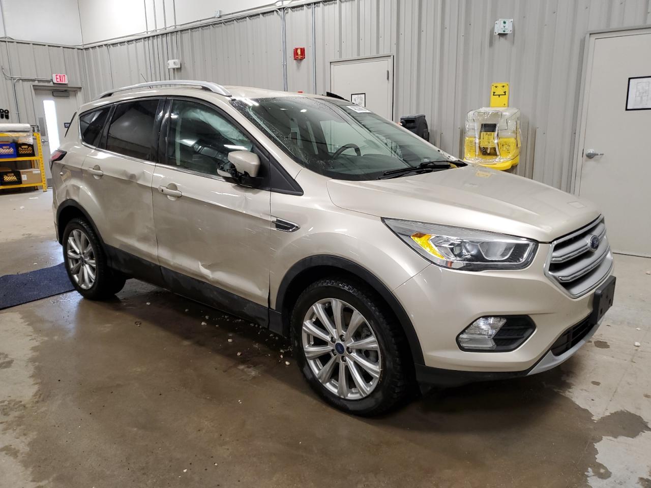 2017 Ford Escape VIN 1FMCU9JD1HUC87663 Copart auction photo, rollover damage thumbnail 4