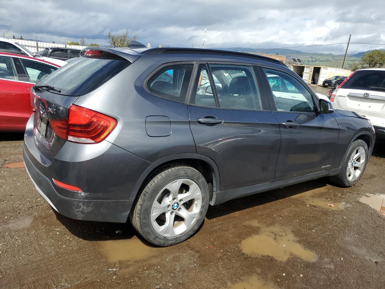 2015 BMW X1 VIN WBAVM1C57FVZ93643 Copart auction photo, burn damage thumbnail 3