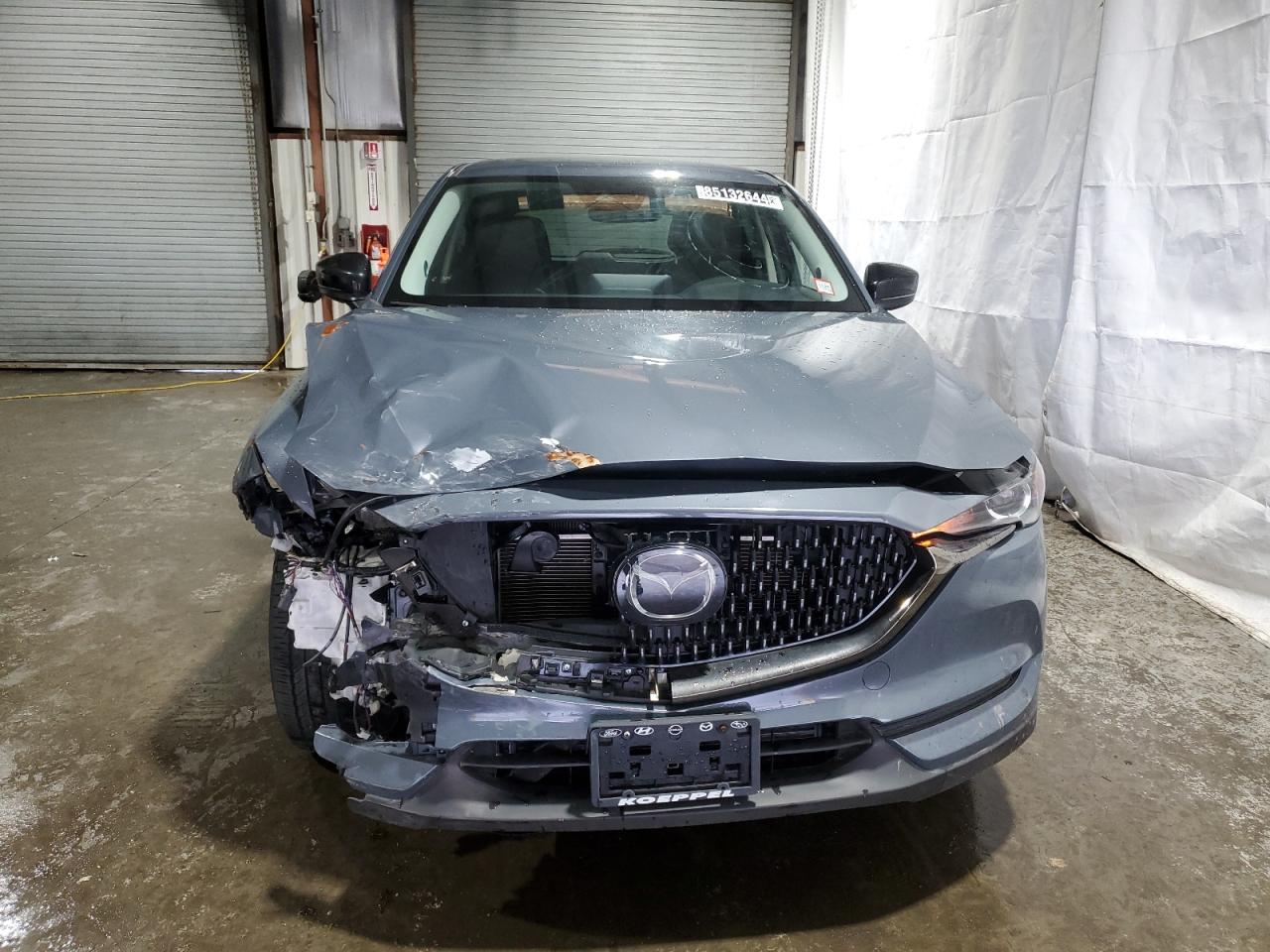 2021 Mazda CX-5 VIN JM3KFBCY2M0437810 Copart auction photo, front end / minor dent/scratches damage thumbnail 5