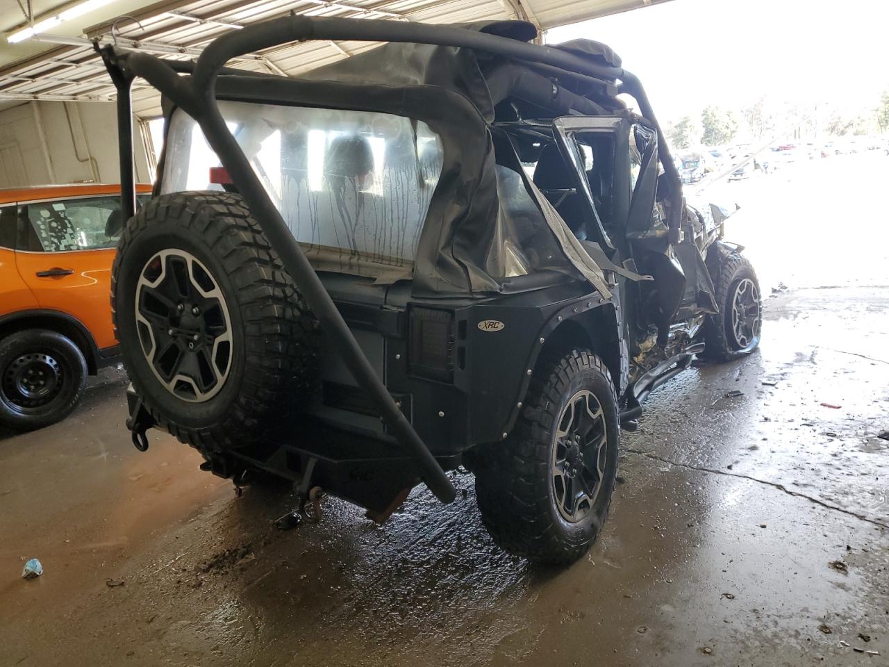 2015 Jeep Wrangler VIN 1C4BJWDG2FL734792 Copart auction photo, all over damage thumbnail 3