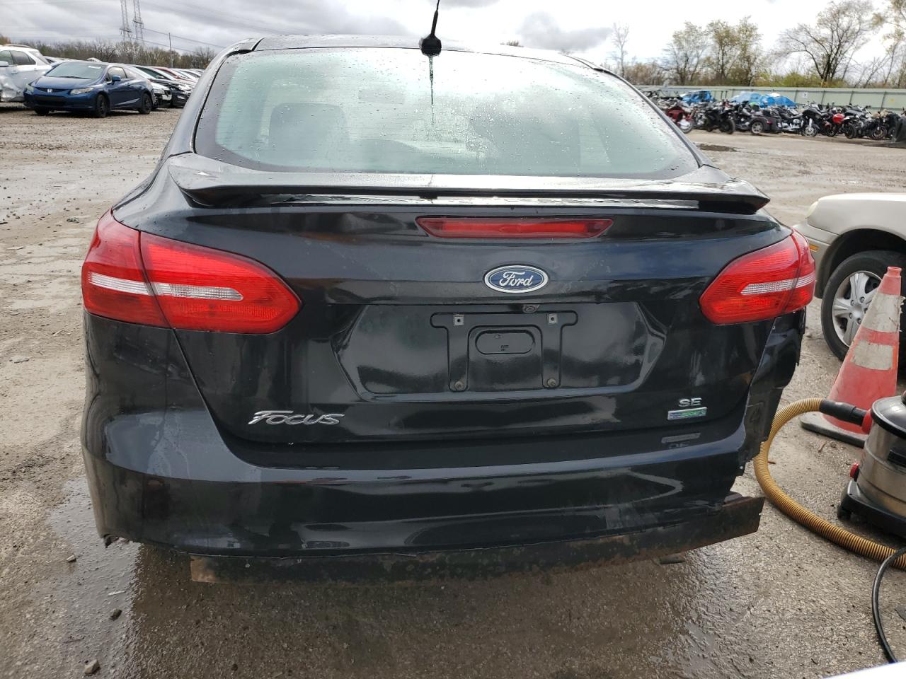 2015 Ford Focus VIN 1FADP3FE5FL347032 Copart auction photo, side / rear end damage thumbnail 6