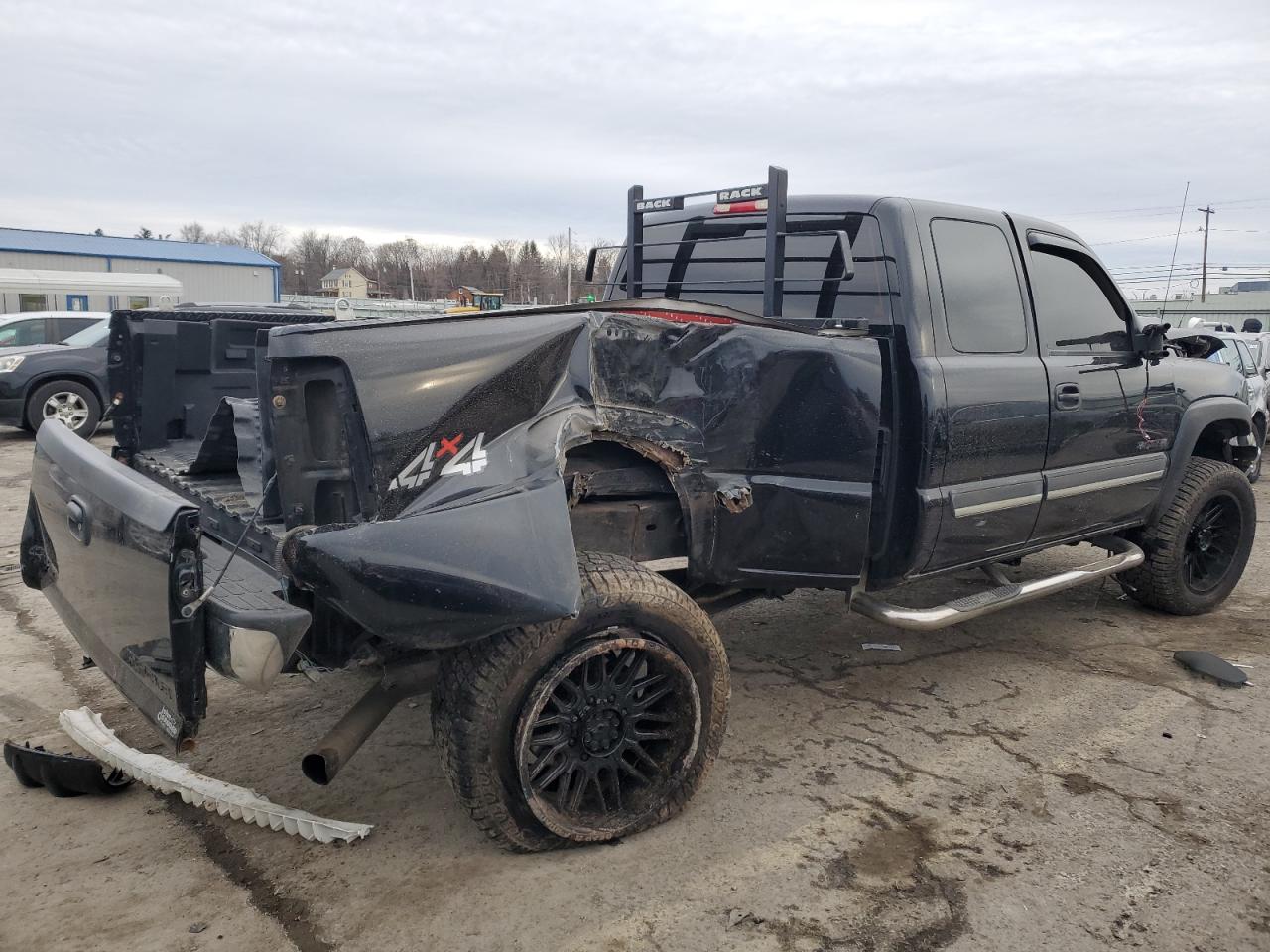 2005 Chevrolet Silverado VIN 1GCHK29U45E128332 Copart auction photo, side / front end damage thumbnail 3