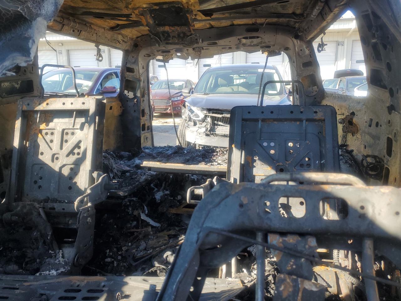 2018 Chevrolet Suburban VIN 1GNSKJKC6JR400164 Copart auction photo, burn damage thumbnail 10