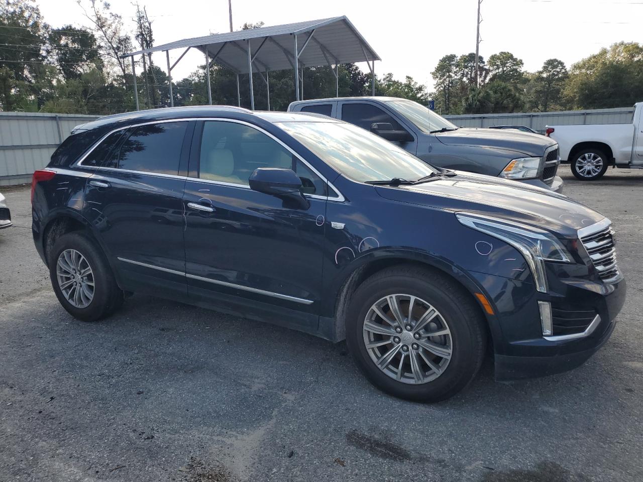 2017 Cadillac XT5 VIN 1GYKNBRS5HZ175548 Copart auction photo, side / front end damage thumbnail 4