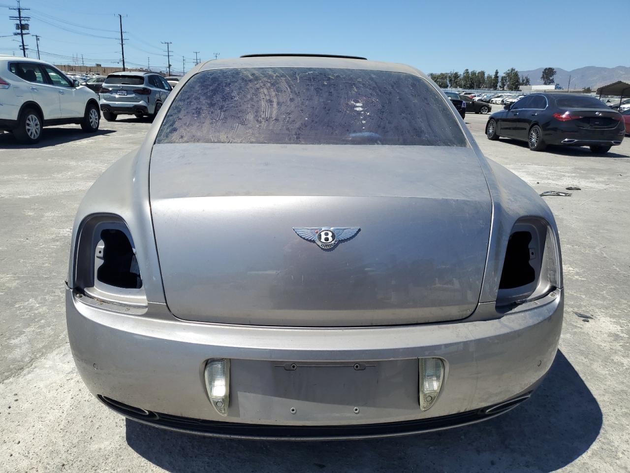 2007 Bentley Continental VIN SCBBR93W77C040445 Copart auction photo, all over damage thumbnail 6