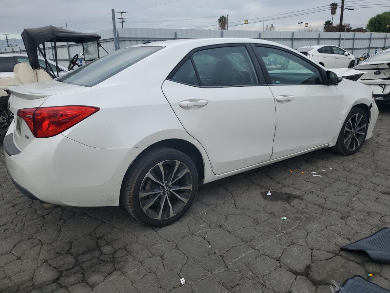 2017 Toyota Corolla VIN 5YFBURHE2HP590687 Copart auction photo, front end / side damage thumbnail 3
