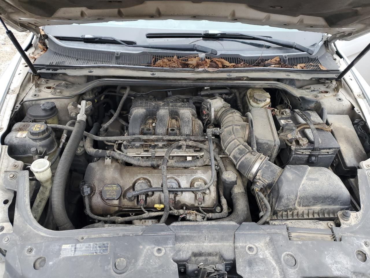 2010 Ford Taurus VIN 1FAHP2JW3AG107751 Copart auction photo, rear end / front end damage thumbnail 12