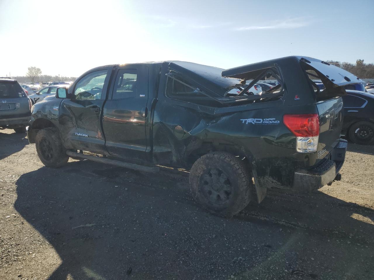 2010 Toyota Tundra VIN 5TFUY5F14AX117533 Copart auction photo, rollover damage thumbnail 2
