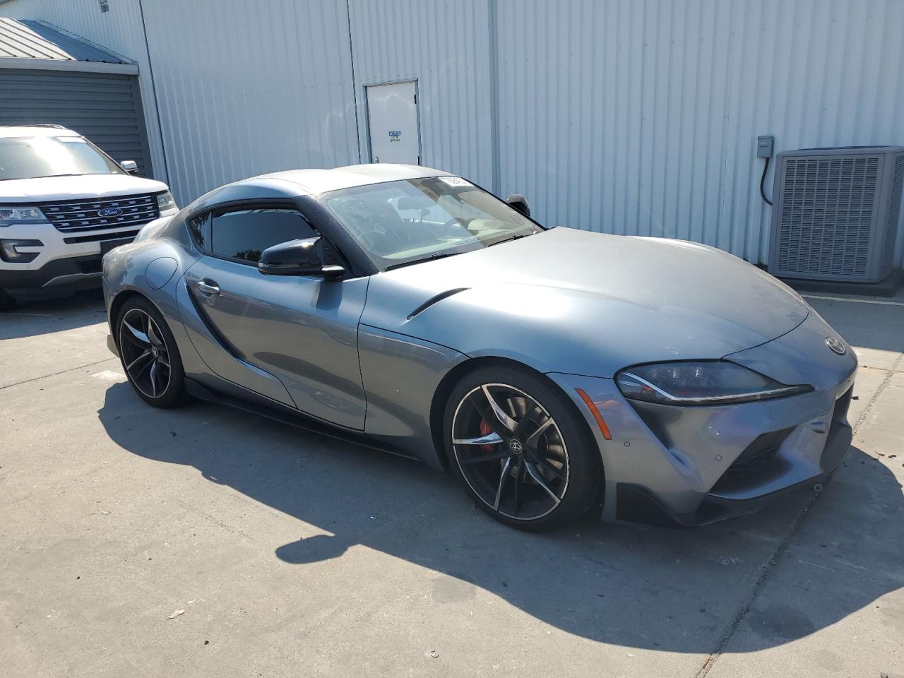 2021 Toyota Supra VIN WZ1DB0C01MW042477 Copart auction photo, side damage thumbnail 4