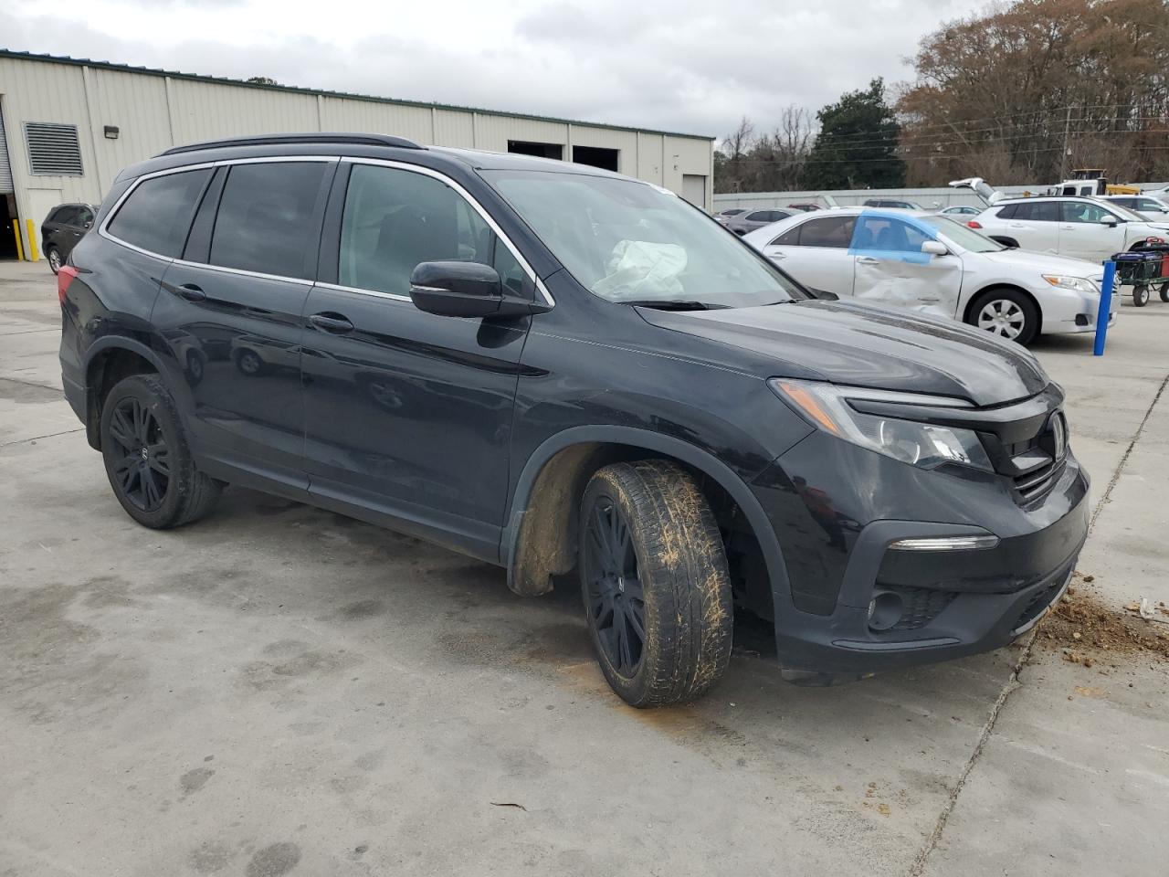 2022 Honda Pilot VIN 5FNYF5H27NB027015 Copart auction photo, all over damage thumbnail 4